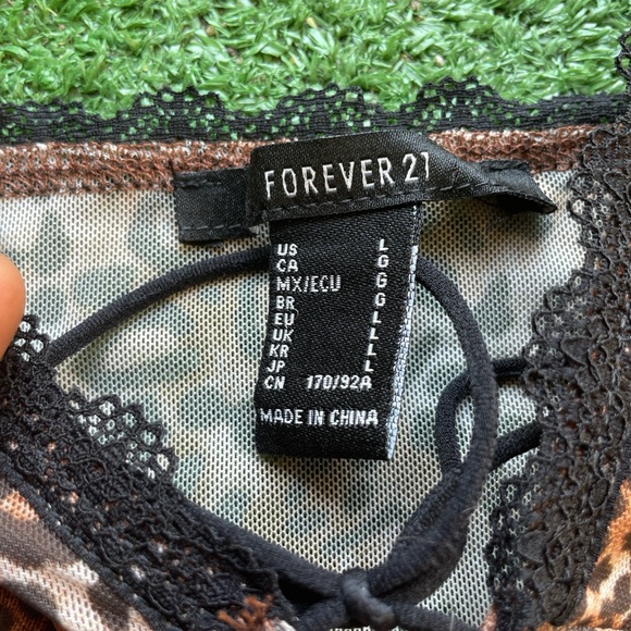 A mesh knit cami featuring an allover leopard print - Picture 3 of 3